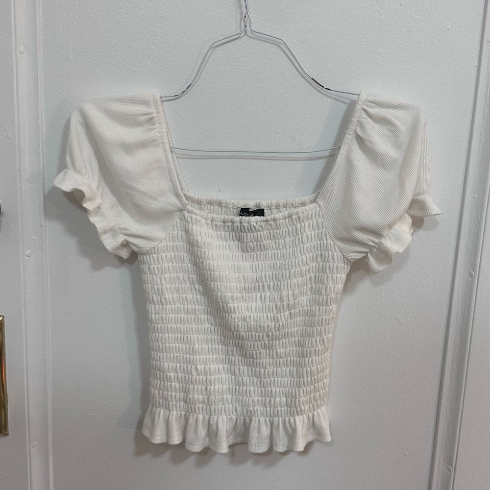 Smocked puff sleeve, waffle, knit blouse with ruffle from aqua in size small
